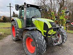 Claas ARES 697 ATZ mit Fronthydraulik und Frontladerkonsolen Stoll